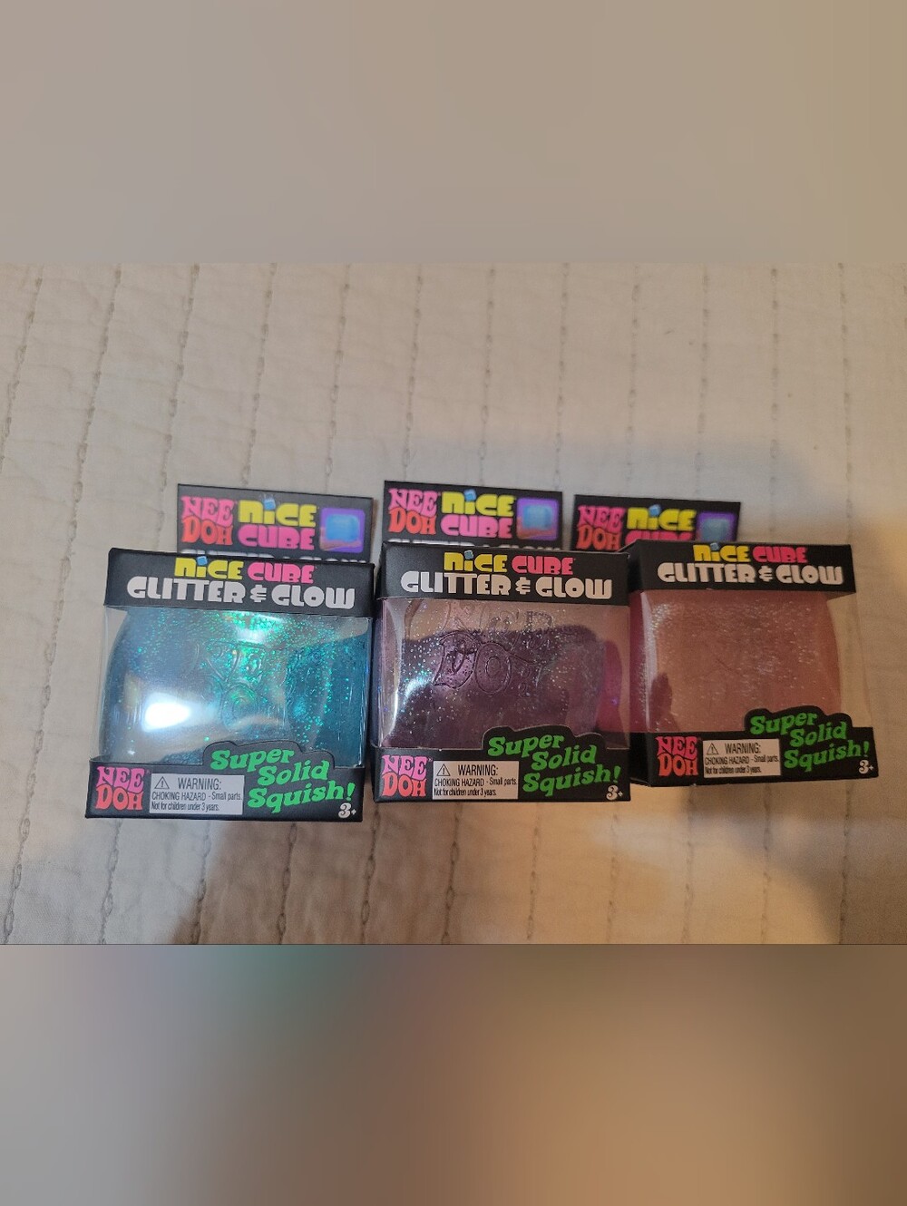 NeeDoh Nice Cube Glitter & Glow Super Solid Squish - Blue, Purple, Pink (3-Pack)
